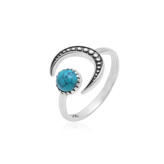 anillo ajustable con media luna y piedra turquesa. es de plata de ley 925. silver half moon turquoise adjustable ring