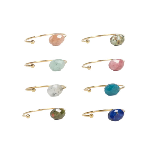 anillo ajustable de acero inoxidable dorado con piedra natural: rodocrosita, amatista, ágata roja, amazonita o piedra africana. Son talla única. Ideales como regalo a adolescentes. 