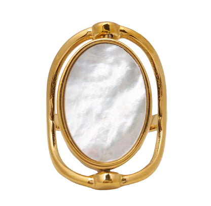 anillo reversible ajustable estilo boho ideal para regalar en el día de la madre o a tu amigo invisible si es mujer. Es de acero hipoalergénico y resistente al agua. Tiene piedra natural nácar y espinela.