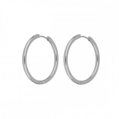 Aros básicos grandes de piercing con cierre fácil resistentes al agua. Son hipoalergénicos y están confeccionados en acero inoxidable con baño de oro 18 kilates. Gold plated stainless steel waterproof hoop earrings for piercing.