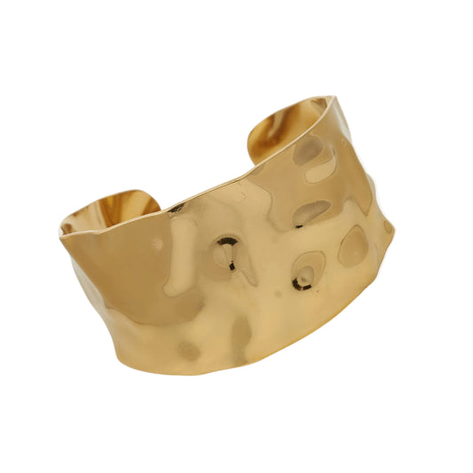 Pulsera o brazalete ajustable y ancho resistente al agua. Está confeccionado en acero inoxidable dorado. Es perfecto para looks de invitada a boda o fiestas de noche boho. Gold plated stainless Steel adjustable waterproof bracelet.dorado