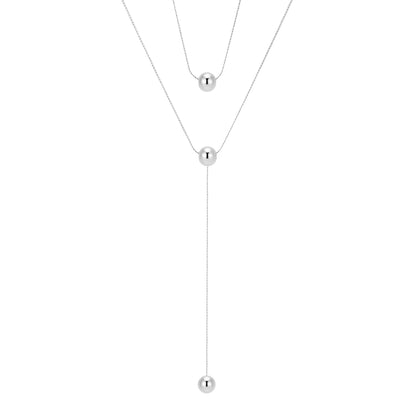 collar largo boho para adolescente o mujer joven que lleve escote en v o escote pronunciado. es de cadena larga con bolas colgantes. ideal para looks de noche o de fiesta. Es de acero hipoalergénico dorado o plateado y resistente al agua