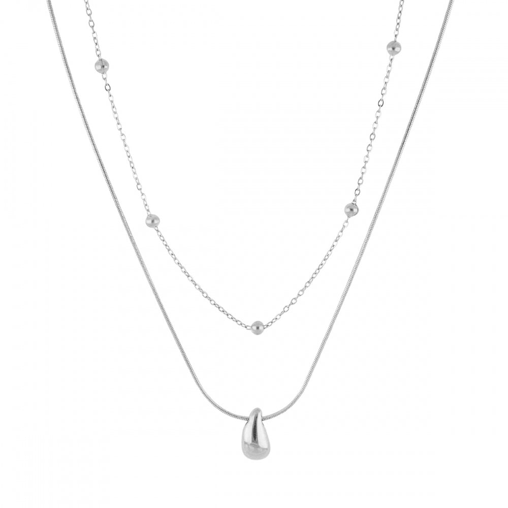 Collar boho de dos cadenas juntas, una de bolitas y otra con colgante de lágrima o gota. Es de acero hipoalergénicos resistente al agua. Son 2 collares en 1.