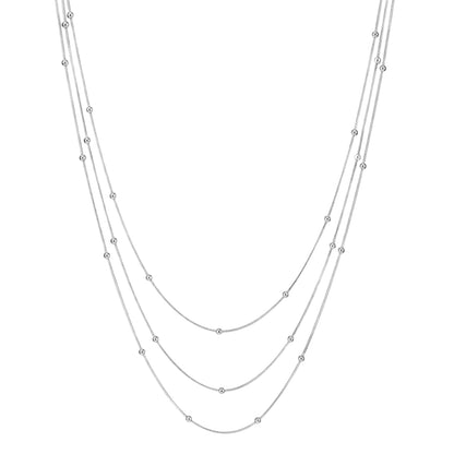 collar triple boho para adolescente o mujer joven que lleve escote palabra de honor, escote en v o escote pronunciado. es de 3 cadenas con bolitas. ideal para looks de noche o de fiesta. Es de acero hipoalergénico dorado o plateado y resistente al agua