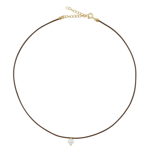 collar de hilo o cordón en color marron con brillante punto de luz. Gold plated sterling silver bead brown thread zircon necklace.