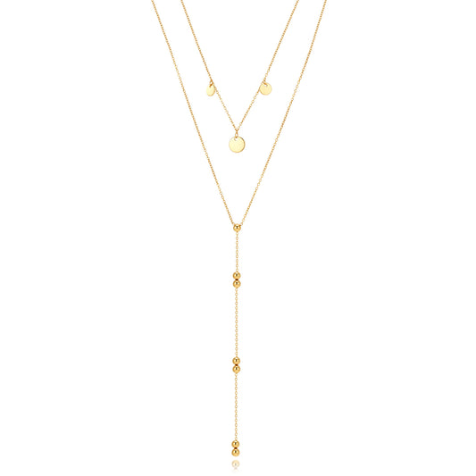 collar largo boho para adolescente o mujer joven que lleve escote palabra de honor, escote en v o escote pronunciado. es de cadena larga con bolas y chapitas colgantes. ideal para looks de noche o de fiesta. Es de acero hipoalergénico dorado o plateado y resistente al agua