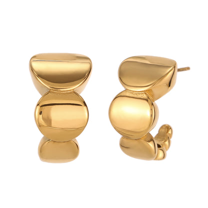 pendientes de aro criolla con forma de onda en acero hipoalergénico y resistente al agua. baño de oro, gold plated stainless steel wavy hoop earrings
