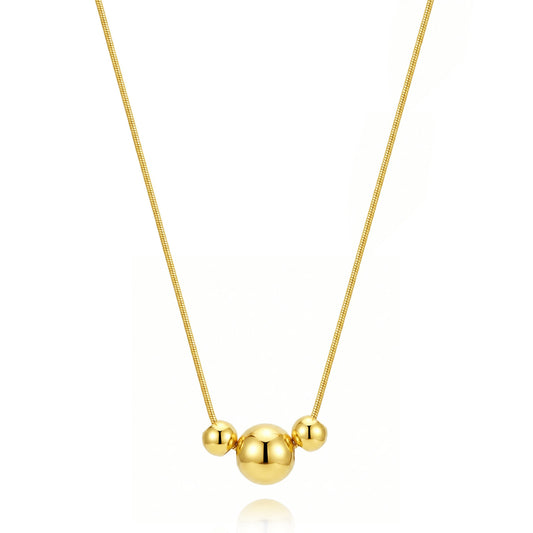 gargantilla boho para adolescente o mujer joven que lleve escote en v o escote pronunciado. es de cadena con bolas colgantes. ideal para looks de noche o de fiesta. Es de acero hipoalergénico dorado o plateado y resistente al agua
