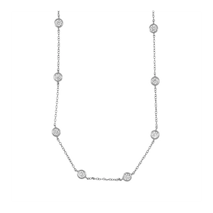 gargantilla de plata de ley con circonitas en círculo tipo punto de luz. Acabados en plata rodiada y baño de oro 18 kilates. Hipoalergénica. 