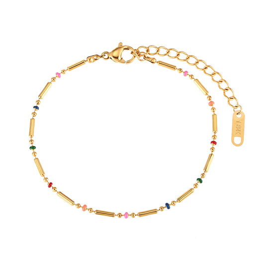 pulsera dorada waterproof o resistente al agua confeccionada en acero con baño de oro de 3 micras. Tiene bolitas de enamel multicolor y el cierre es ajustable. collar hipoalergénico e inoxidable. gold plated stainless steel rainbow bead bracelet.