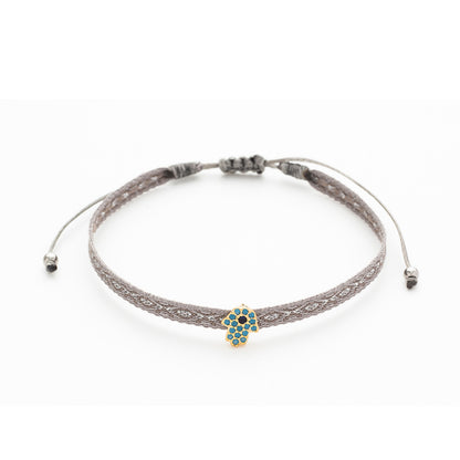 pulsera ajustable con mano de fátima o hamsa. Es perfecta para regalar en verano