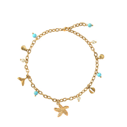 tobillera para verano resistente al agua en colores dorado,  azul turquesa y coral. tiene abalorios de concha, ESTRELLA DE MAR Y cola de ballena. Es de acero hipoalergénico