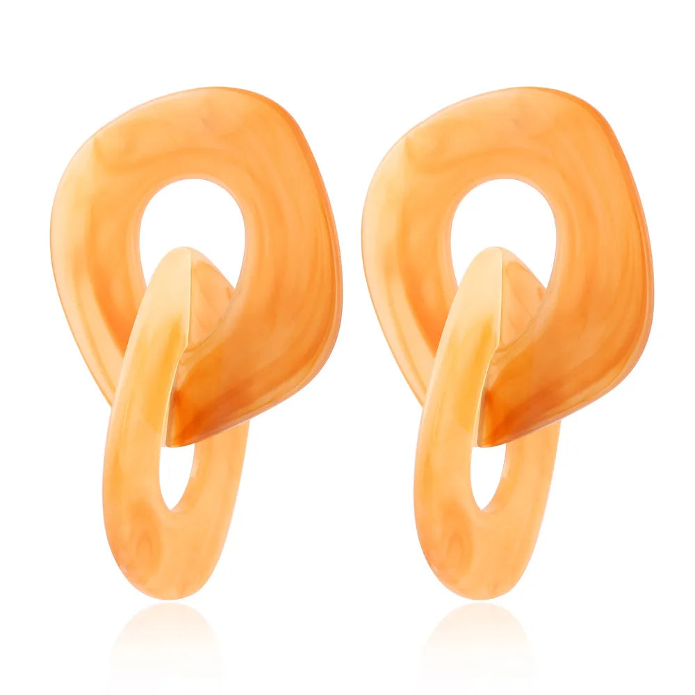 Pendientes de eslabón grande carey o con resina amarillo o butter yellow para invitada a boda de primavera verano. no pesan y son de estilo años 70 como los que llevaba cher, farrah fawcett o Twiggy