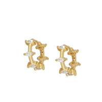 aritos de piercing con cierre fácil confeccionados en plata de ley con baño de oro y circonitas. Gold plated silver zircon hoop earrings for piercing