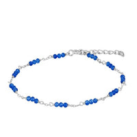 PULSERA con mineral de jade azul y personalizable con inicial. Está confeccionada en plata de ley con baño de oro 18 kilates.  Blue jade mineral bracelet that can be customized with your initial letter. It is made of sterling silver and 18 gold carat plated